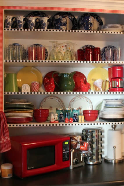 All my kitchen plates and such are now on display in the open cabinets in my less than $50 redo.