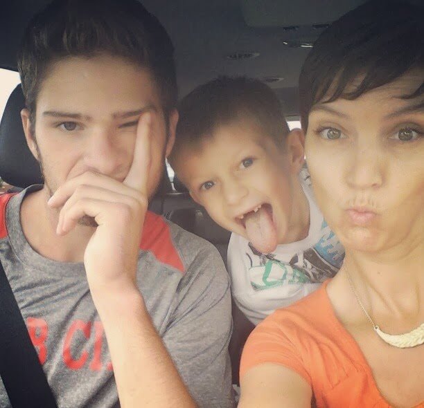 Michelle Edwards with her two sons in her car being silly before cancer took her life. 