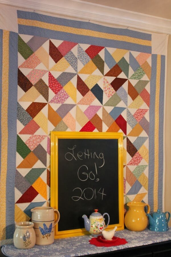 Here is a smaller quilt rather than a full-sized one hanging on my dining room wall.