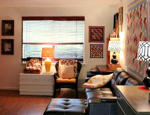 My living room with the green dresser at one end of my couch/chaise.
