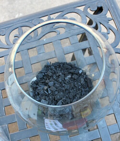 In Assembling A Terrarium In A Jar, clean a clear jar and then add charcoal
