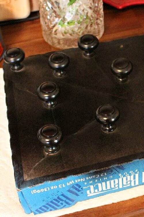 The spray painted knobs.