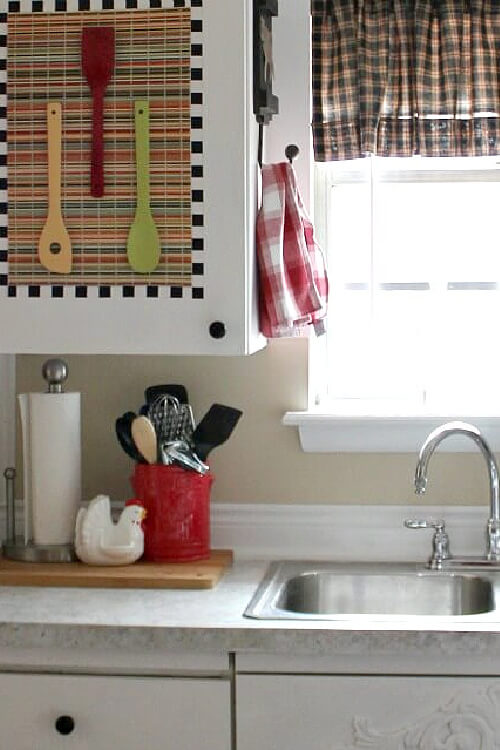 In apartment kitchen redo #2, I ended up putting the cabinet doors back on and DIYing them.