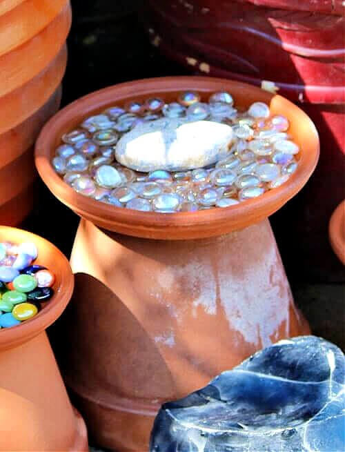 To create a bee and butterfly water source, all you need to do is set out water with pebbles for them to land on.