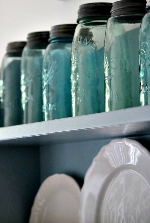 Vintage mason jars and white dishes