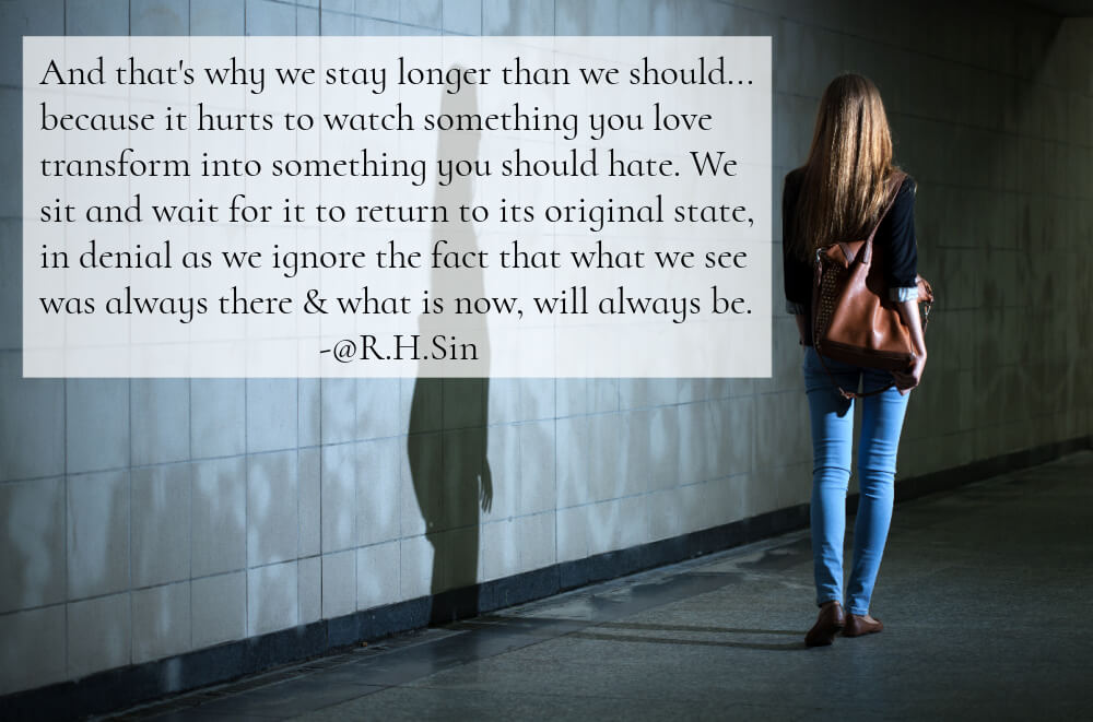 Woman walking away because it hurt too much to watch something you love turn into something you should hate.