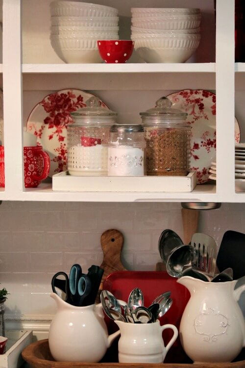 In Refreshing The Kitchen Counter Top, my open kitchen shelves with red and white dishes and decor inside