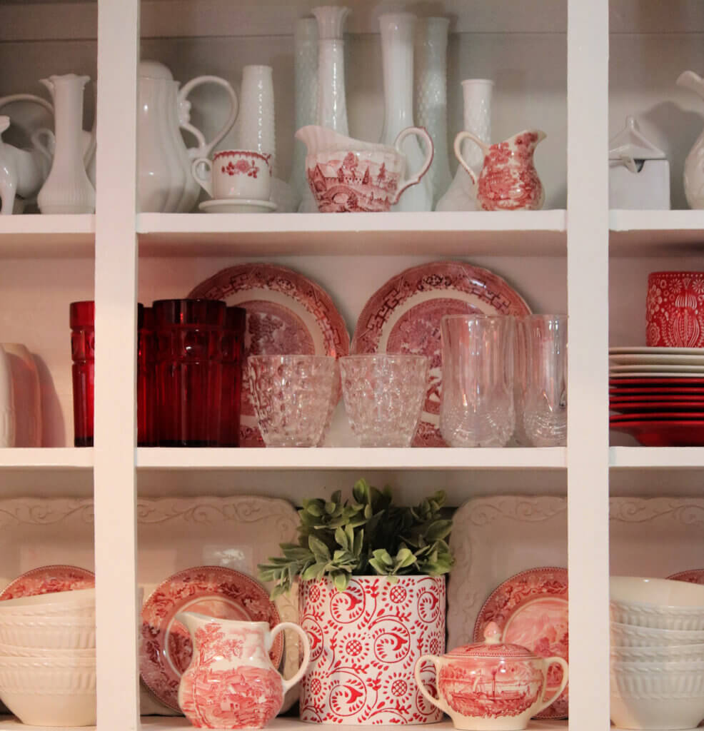 My kitchen shelves with m collection of red transfer ware