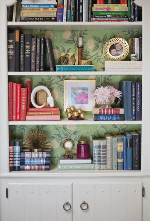 Bookcase with wallpaper on the back