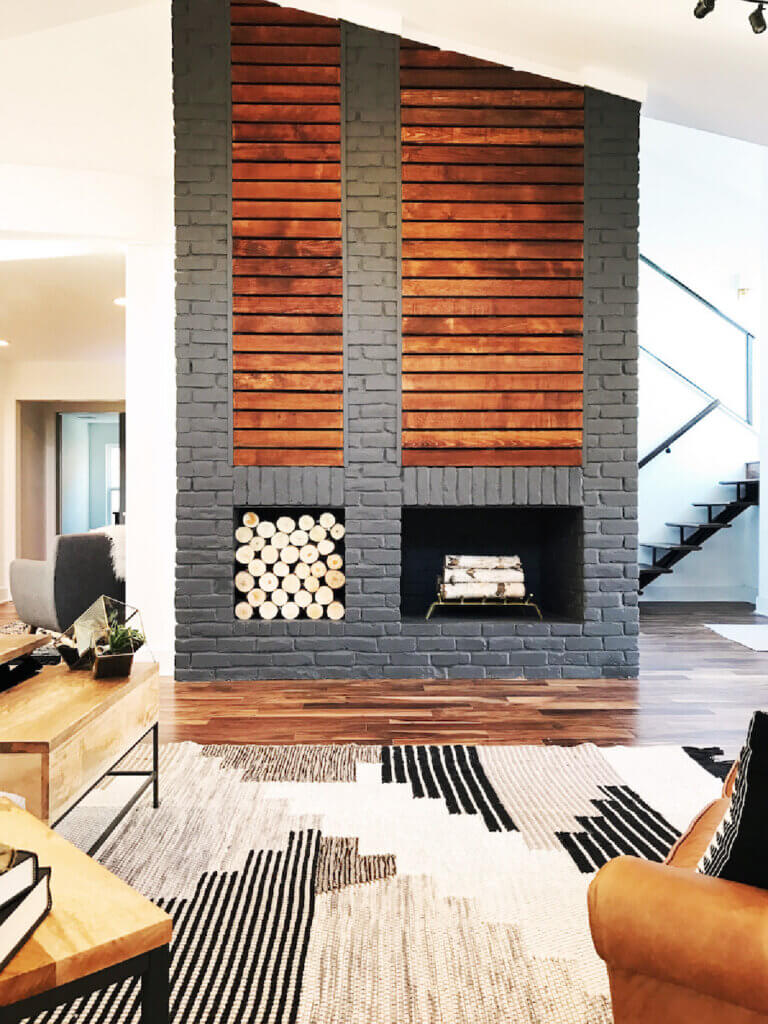 A modern living space with a gray fireplace
