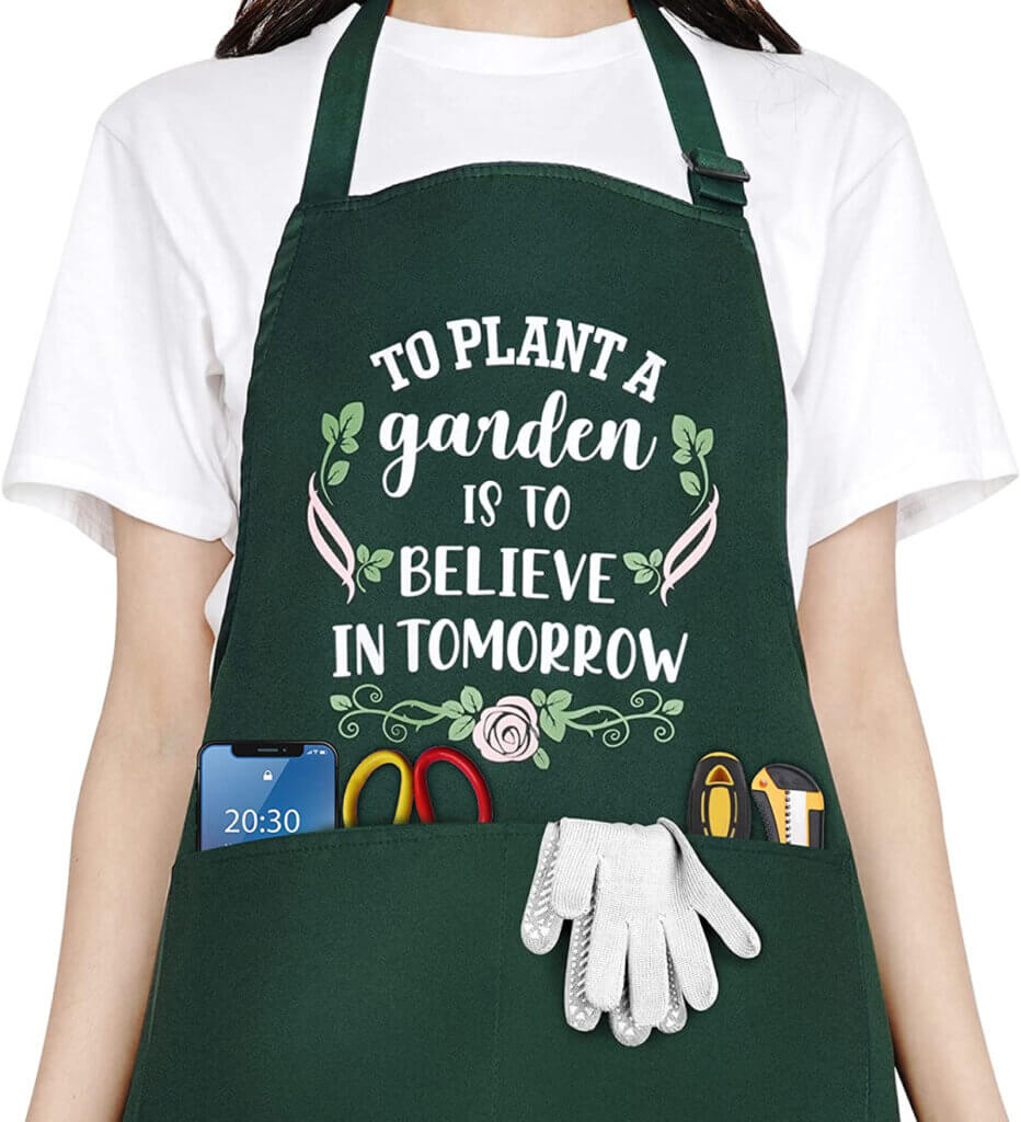 In 10 gifts for gardeners under $50 has a green apron with a gardening phrase.