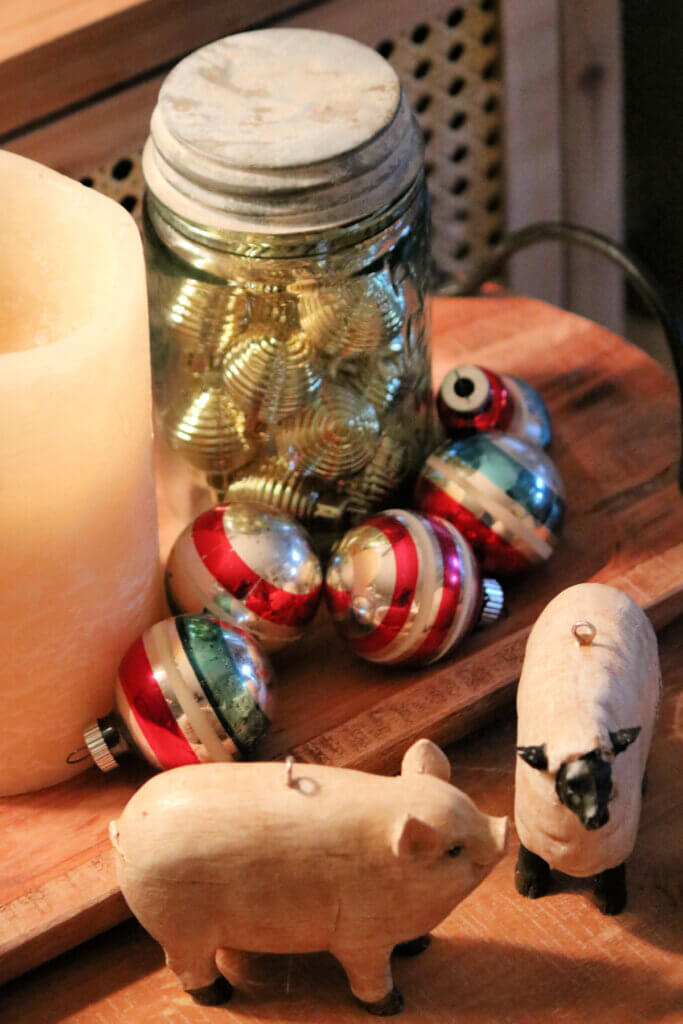 I added some small gold ornaments to a vintage Mason jar.
