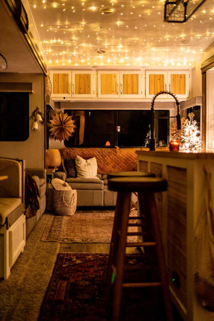 In decorating your rv for Christmas, here is the camper lit up and cozy at night.