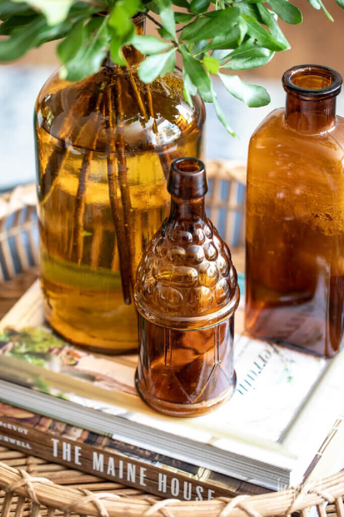 In 10 Fall Decor Ideas For Your Home, here are a trio of pretty brown bottles