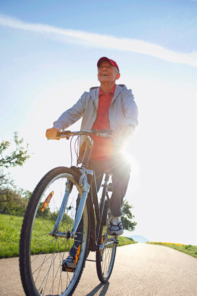 In Winter Wellness Tips For Seniors, it's important to get exercise such as riding bikes.