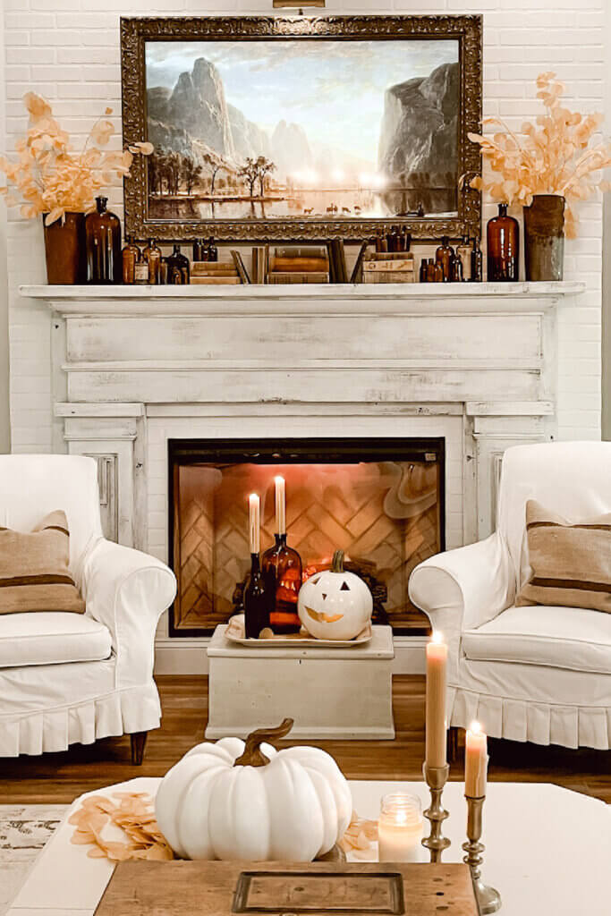 In 10 Fall Decor Ideas For Your Home, here is a living room decked out for fall in neutral colors