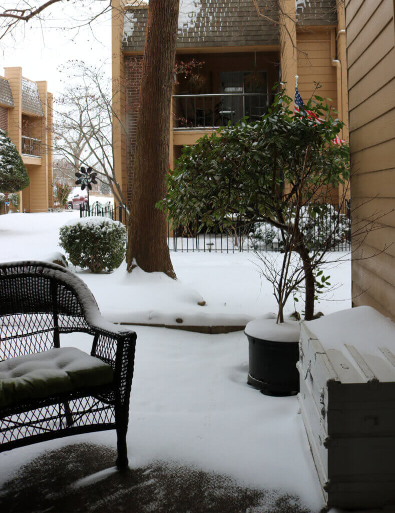 In Snow In Oklahoma & Creating A Home, the view of my patio covered with snow