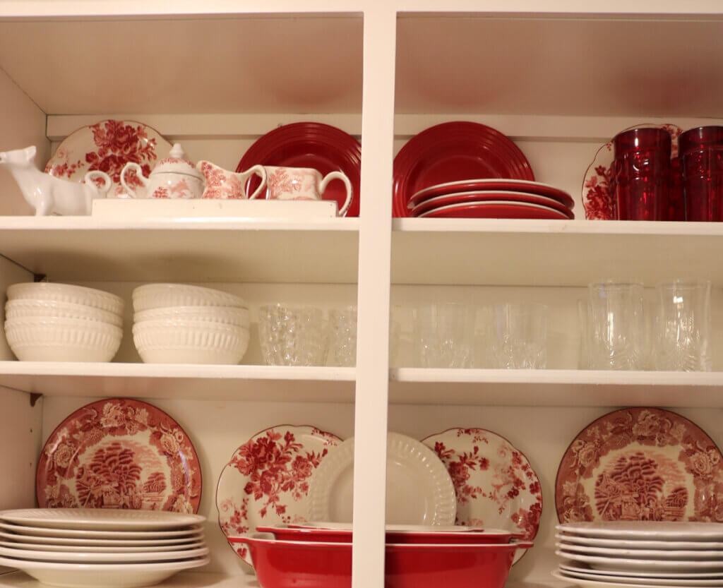 One Section Of My Kitchen Is Decorated, and here is my newly open cabinets with red and white dishes
