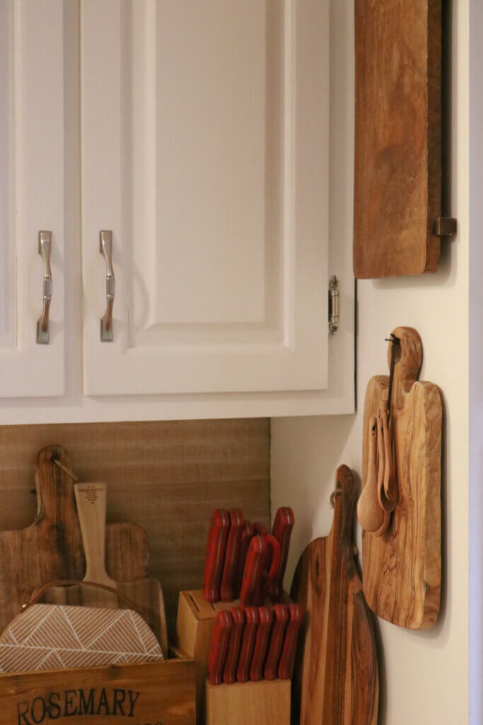 In When Decorating One Thing Leads To Another, there are now many cutting boards hanging on my kitchen wall.