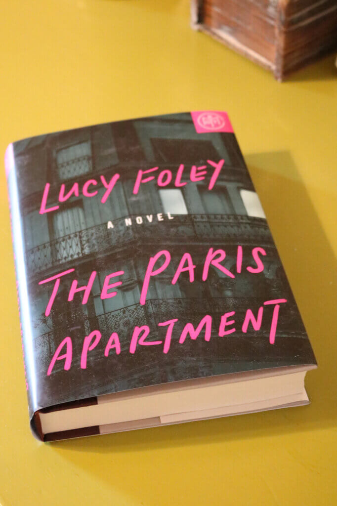 In Gracie Acting Strange & What I'm Watching & Reading, here is the front cover of Lucy Foley's The Paris Apartment