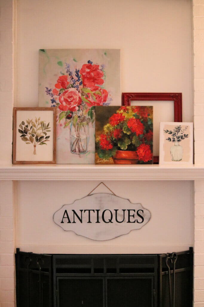 The mantel as I arranged the paintings on it last week