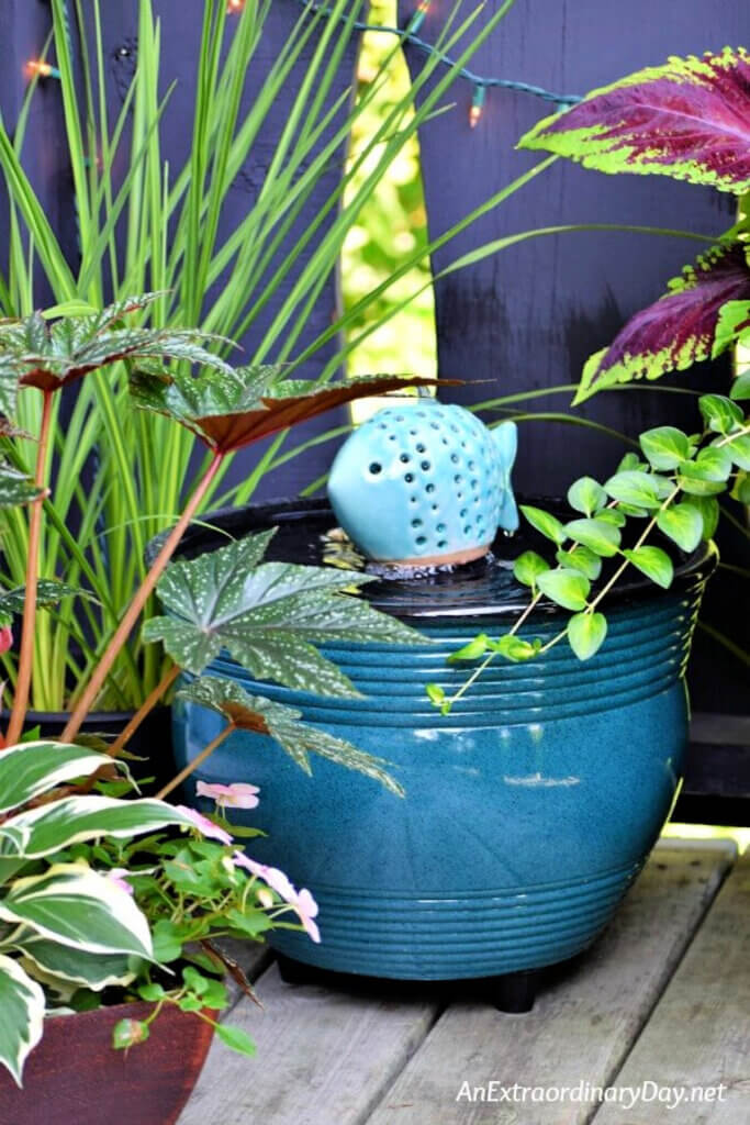 An Extraordinary Day blogger created this container fountain with a pot and a few other elements.