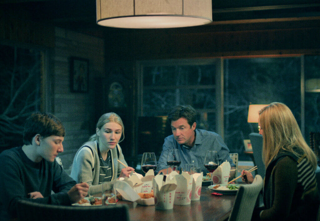The Byrde family are sharing a meal together on the Netflix show, Ozark