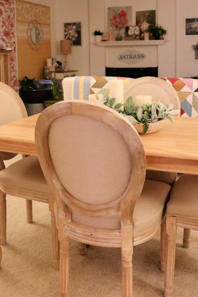 Distressed French Country dining chairs in my apartment dining space.