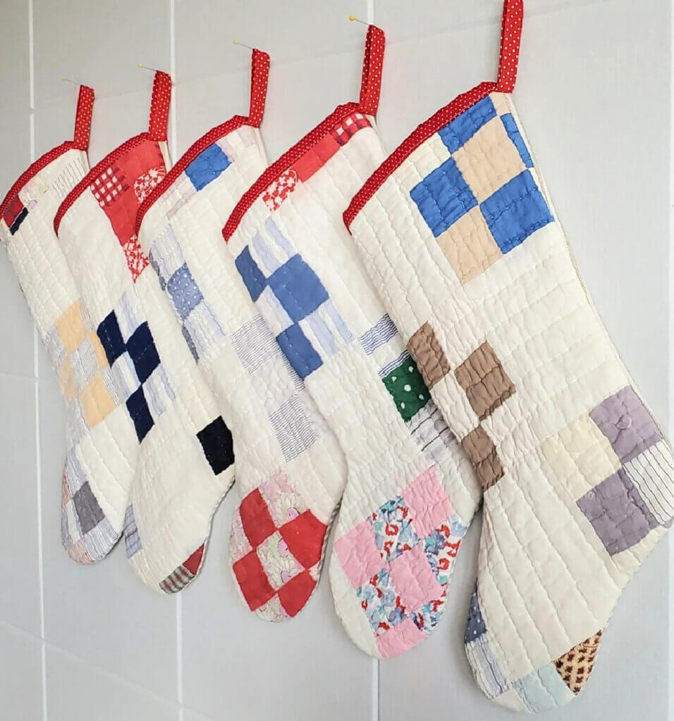 In Patchwork Quilts, Cats & Peace, here are worn quilts made into Christmas stockings at an Etsy shop
