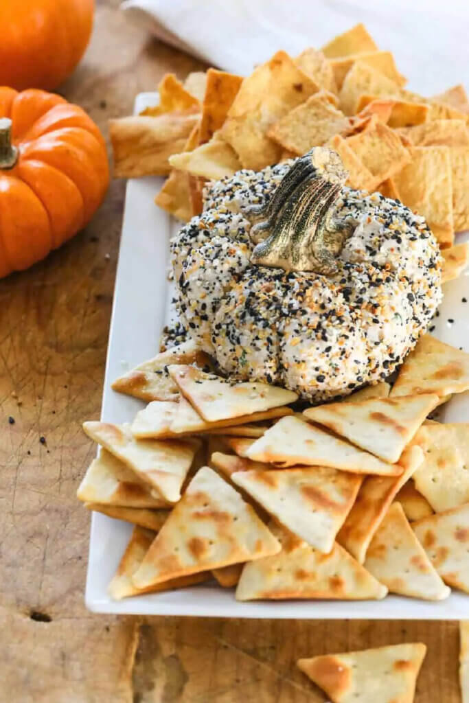 In 8 Thanksgiving Themed Cheese Ball Recipes, this cheese ball is coated with spices and looks beautiful.