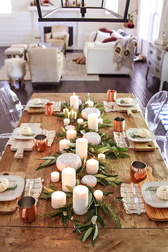 In Thanksgiving Table Inspiration For 2022, a rustic table with fall elements for Thanksgiving day.