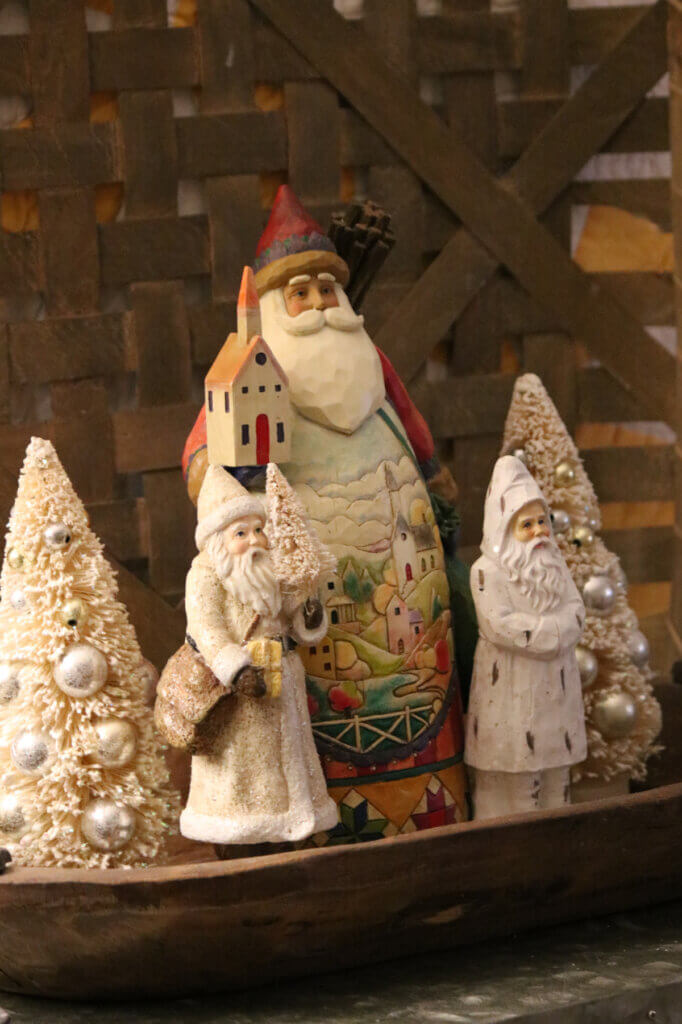 In Christmas In The Living/Dining Room, these are three of my Santa figurines.