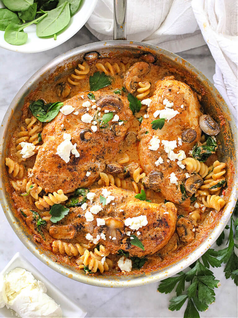 In New & Notable Mentions 2/18/23, this is a recipe for one pan chicken with creamy sun dried tomato pesto sauce