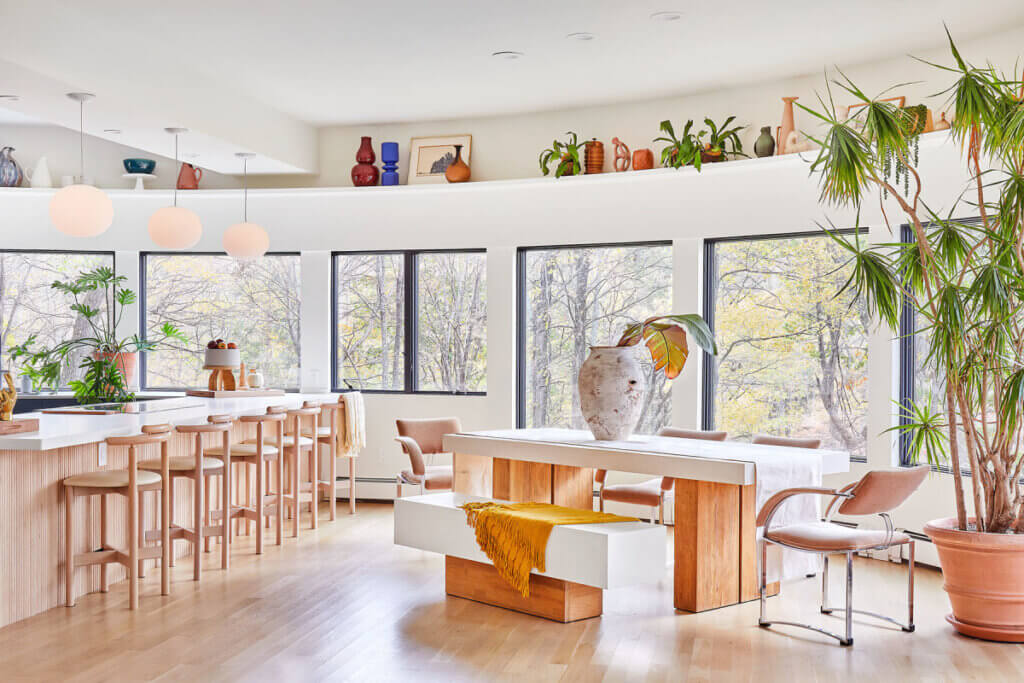 In A Collector's Colorful New York Home, there are many large windows