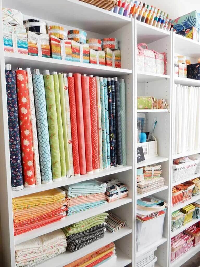 In Ideas For Craft & Sewing Rooms, this is a great space to store bolts of fabric