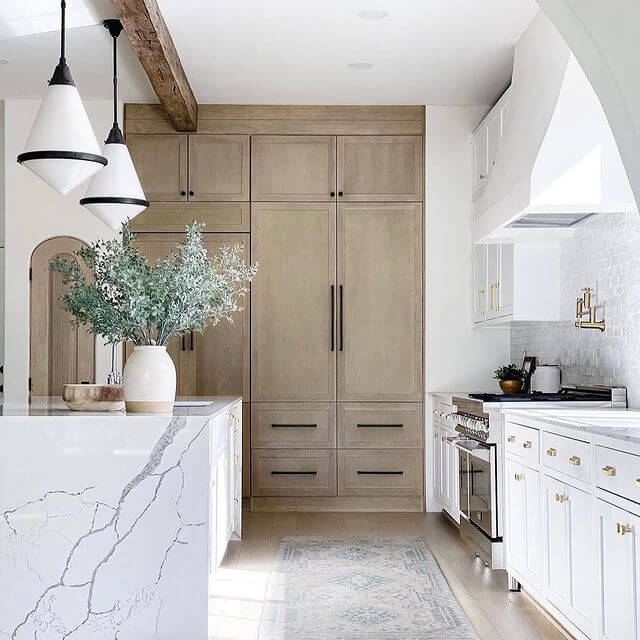 In what is a modern farmhouse kitchen, the metals are often mixed.