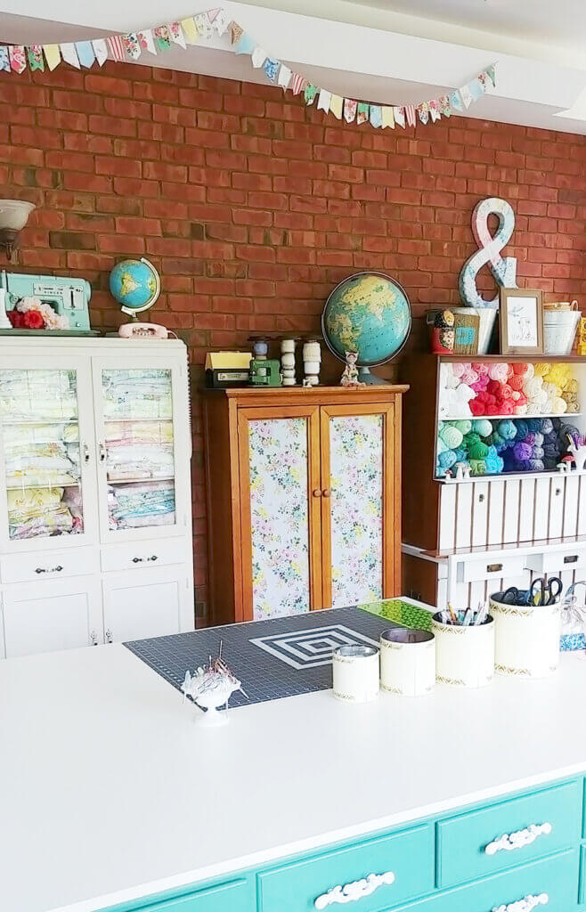 In Ideas For Craft & Sewing Rooms, this is a cute space that doesn't take up much room to create things.