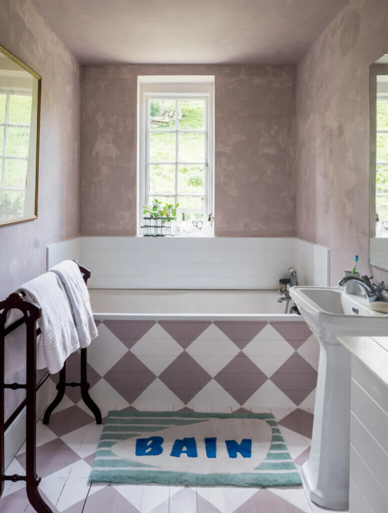 A bathroom painted in a checkered design