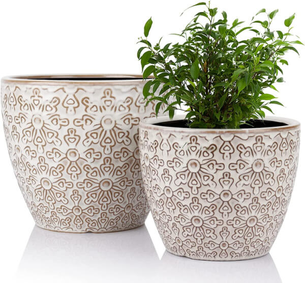 In 10 Plant Pot Choices At Amazon, this set of pots have a brown on white design