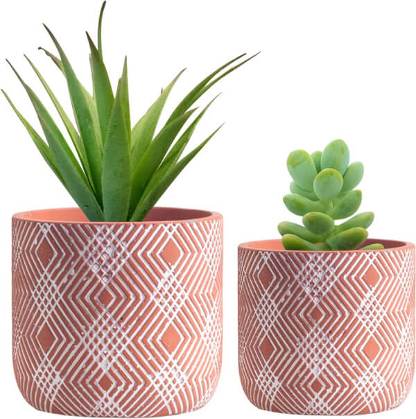 In 10 Plant Pot Choices At Amazon, this is a set of 2 terracotta with a white design plant pots