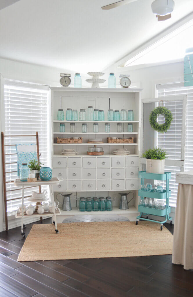 In How To Put Collections On Display, Fox Hollow Cottage shows how she displays her large collection of Mason jars.