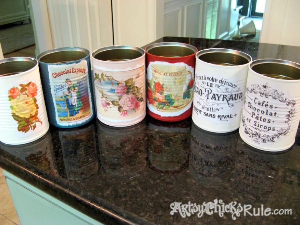 In Frugal Crafts: Don't Throw Out Those Cans, decorate empty vessels like this and make them pretty.