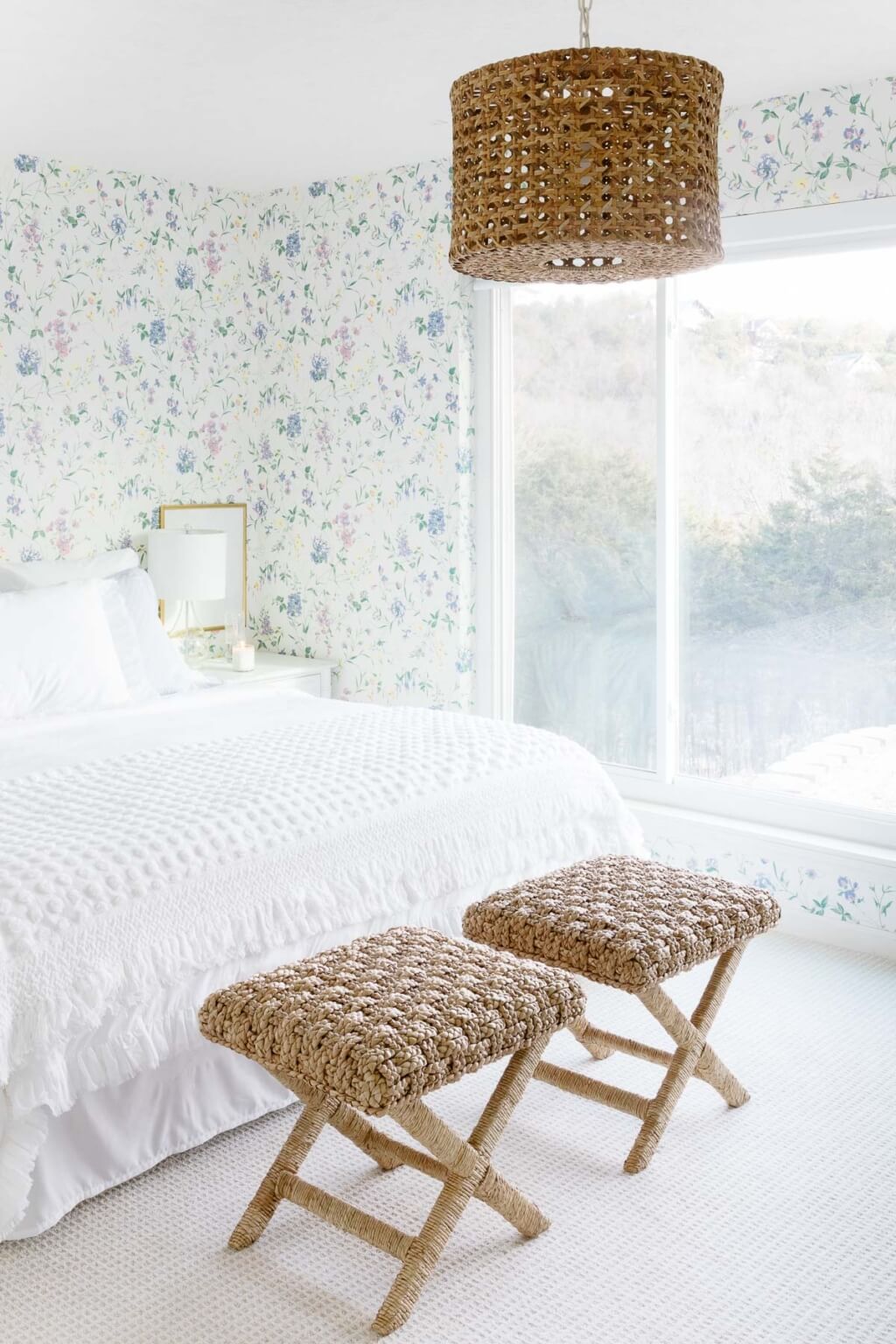 In Cozy Cottage Minimalist Rooms & Decor, this is a Serene white bedroom with pastel wallpaper