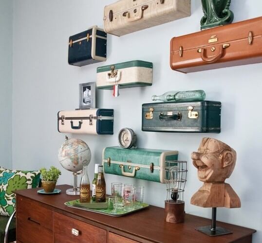Suitcases cut up to use as shelves