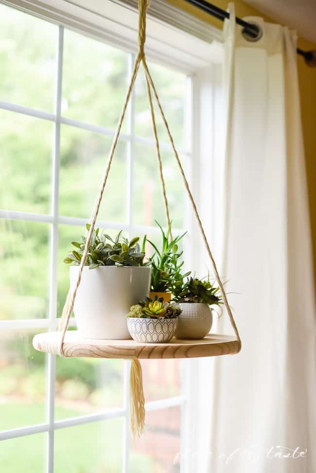 A boho style plant shelf to hang from the ceiling