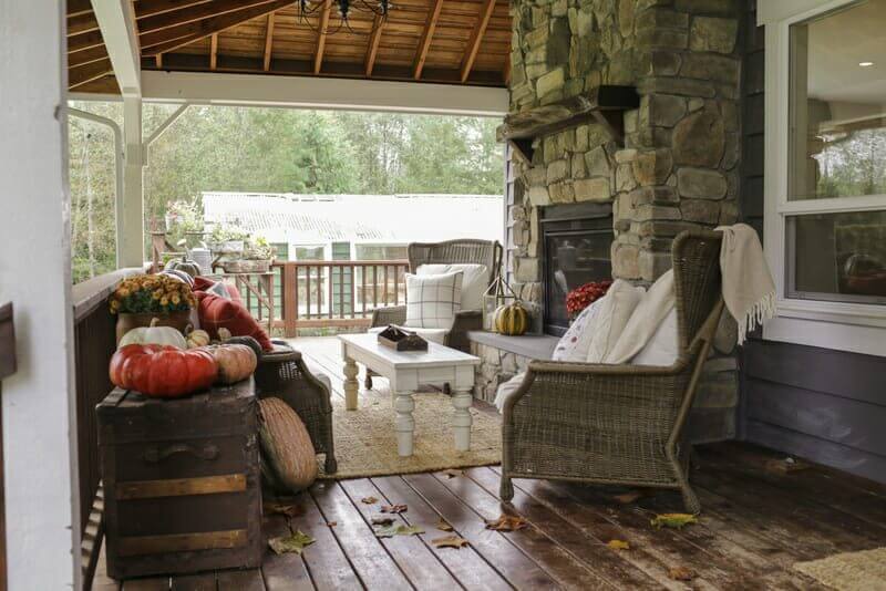 A photo of a porch during the fall season
