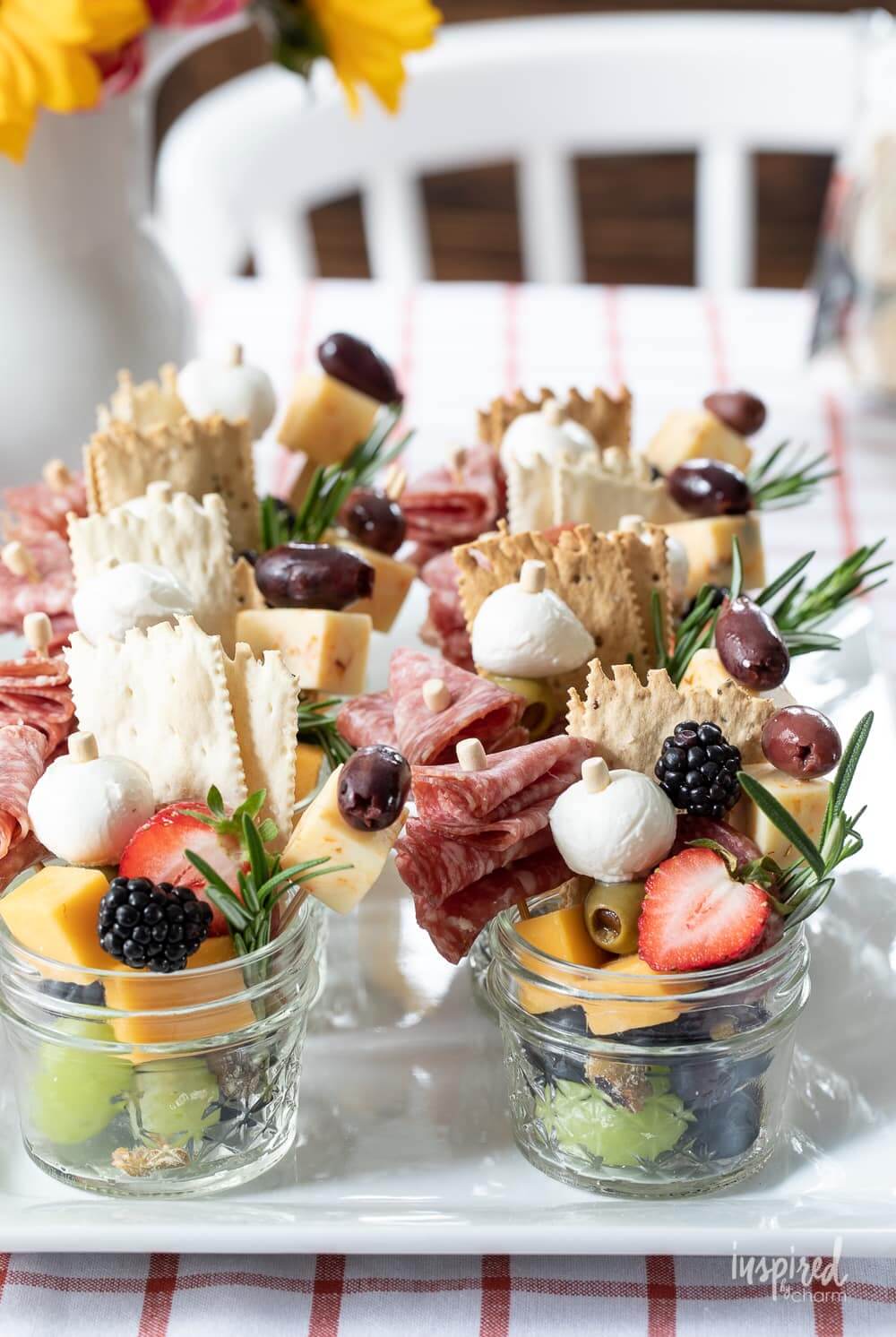 In 10 Delightful New Year's Eve Appetizer Recipes, this is a jarcuterie by Inspired By Charm