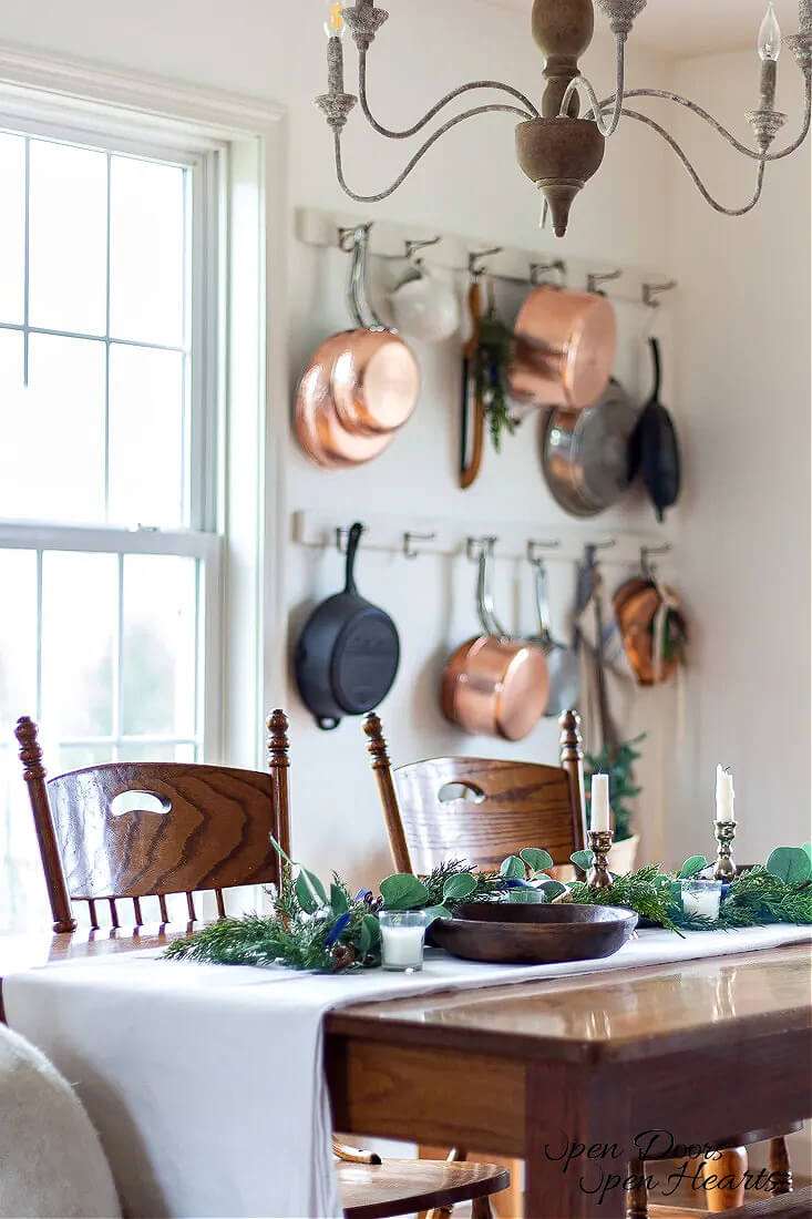 The Love Of Home Files #12: Winter Table Greenery used as a centerpiece with candles. 