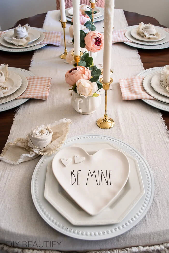 DIY Beautify sets a Valentine table showing her rose shaped fabric napkins in The Love Of Home #14.