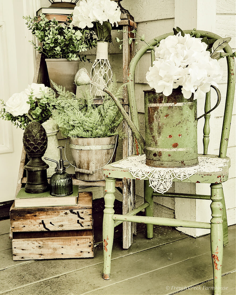 Chippy and shabby themed greens in a vignette 